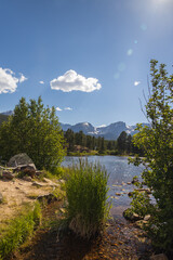 Sprague Lake with blue sky and white clouds in the sky background, Rocky Mountain National Park, Colorado