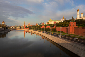 The sky is reflected in the Moskva River near the Kremlin