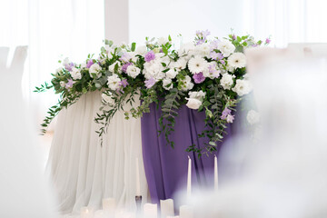 Main table at a wedding reception with beautiful fresh flowers