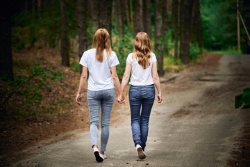 Girlfriends enjoying a hiking trip in the forest