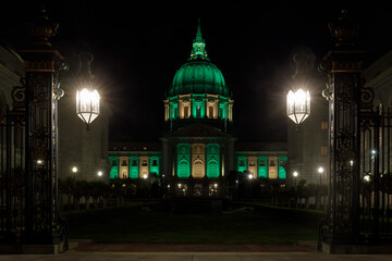 San Francisco City Hall Lit in Yellow and Green in Celebration of Mother's Day at Night.