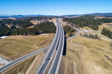 Old road and new highway from Krakow to Zakopane in Poland, called Zakopianka with viaducts,...