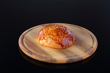 Hamburger sesame bun. Top half burger bun.