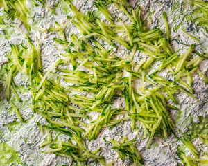 Food photophone with curd cheese, dill and cucumbers on pita bread for making a roll