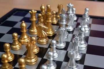 Chess board game to represent the business strategy with competition in the world market. and find out the best solution to meet target objective and goal. Sign and symbol of challenging as concept.	