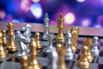 Chess board game to represent the business strategy with competition in the world market. and find out the best solution to meet target objective and goal. Sign and symbol of challenging as concept.	