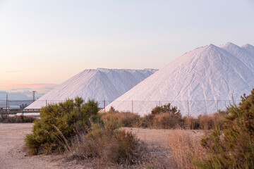 Salt mountains in the Santa Pola salt flats of Alicante, Spain