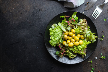 salad olives green olive fruit leaves lettuce mix fresh healthy diet meal keto or paleo diet
veggie vegan or vegetarian food food snack copy space food background rustic top view 