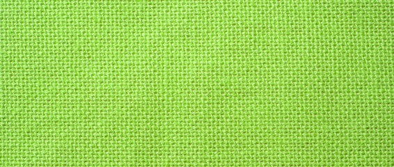 natural green napkin linen fabric texture background .