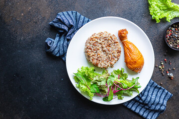 buckwheat chicken leg salad porridge leaves green lettuce mix fresh healthy appetizer diet meal snack copy space food background rustic. top view keto or paleo diet