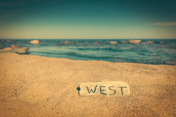 Piece of board with the word 