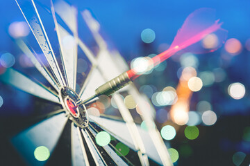 Bullseye is a target of business. Dart is an opportunity and Dartboard is the target and goal. So both of that represent a challenge in business marketing as concept.	