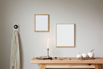 Two thin wood frames mockup. 8x10 and 11x14 sizes. Bohemian style props, decorated for fall.