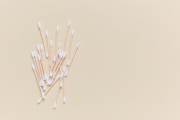 Eco-Friendly Bamboo cotton buds on a beige background. Zero waste, plastic free lifestyle concept.