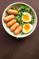 sausages salad egg leaves green lettuce mix fresh healthy appetizer diet meal snack copy space food background rustic. top view 