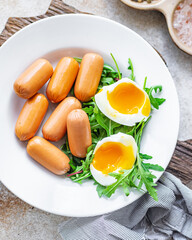 sausages salad egg leaves green lettuce mix fresh healthy appetizer diet meal snack copy space food background rustic. top view 
