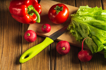 Set of vegetables for a salad diet. Cooking salad in the restaurant kitchen. Free advertising space