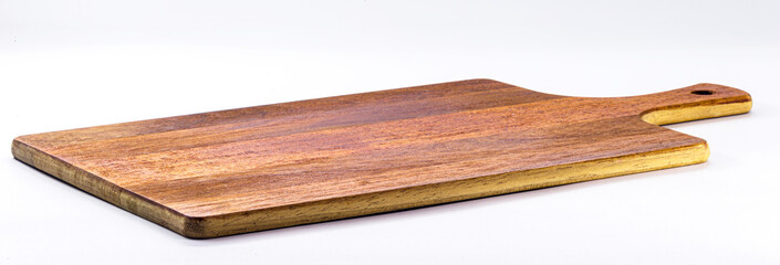 Kitchen utensils, vintage wooden chopping board, isolated white background