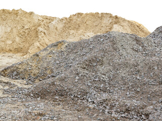 A pile of slag and sand on the ground