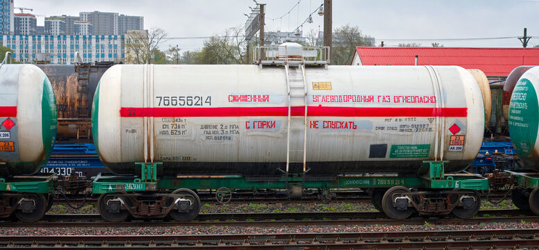 Minsk, Belarus. May 2021. Tank cars train for carrying liquefied petroleum gas and deliver LNG by rail. Safety during storage, transportation of petroleum products. Ukrspetstransgaz lpg railroad tanks