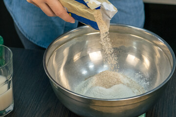 woman cooking with flour