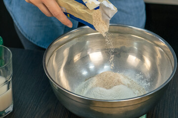 woman cooking with flour
