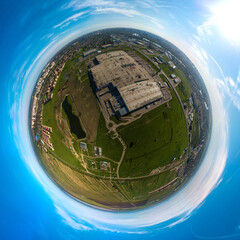 aerial small planet 360-panorama of new houses built in a flat field in the southern suburb of the city of Krasnodar in southern Russia on a sunny spring day. Kuban river, lake and mountains on the ho