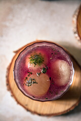 pink elderberry mocktail in a glass