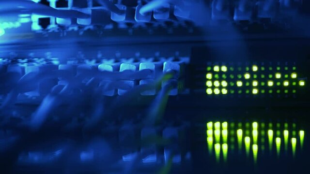 Close up fiber optic in server room. Network cables installed in the rack at data center. Ethernet cable on network switches background