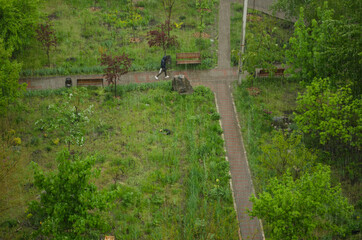 Heavy rain outside, wet people