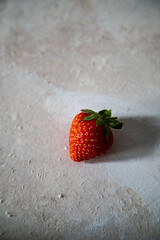 isolated fresh whole strawberry