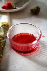 raspberry syrup in a glass