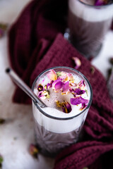 vegan hibiscus and rose latte in a glass