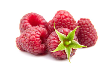 Fresh raspberries isolated on white background. Heap of red raspberries