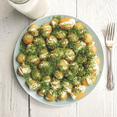 Background of new potatoes with dill