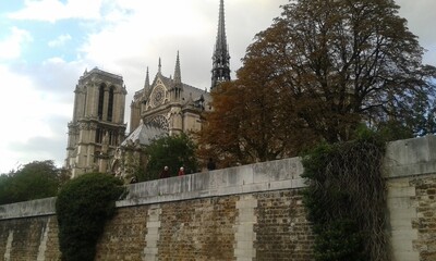 2015 year sigthseeing tour onleft notre cathedral. paris, france.