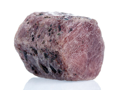 macro mineral stone ruby on a white background