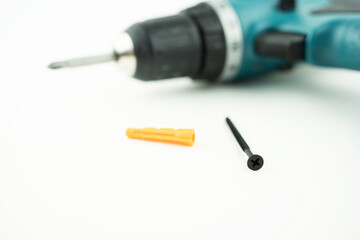 screwdriver and screws on the table in