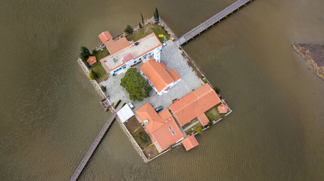 Aerial drone view od Agios Nikolaos Monastery on the Vistonida Lake at Porto Lagos, Greece