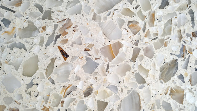 Piso de terrazo claro, texturas de piedras. Mosaico