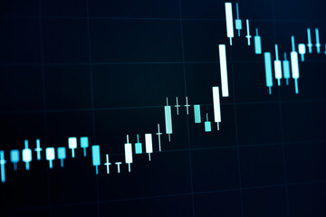 Charts of stock market instruments with various type of indicators and volume analysis for professional technical analysis on the monitor of a computer. Fundamental and technical analysis concept.	
