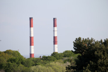 Fototapeta na wymiar industrial chimneys against the sky