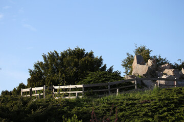 wooden fence and stones in the park