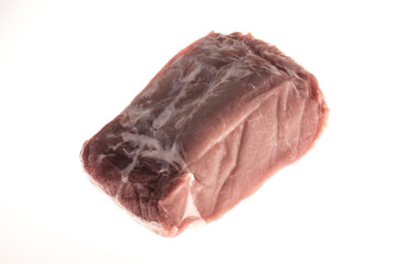 Pork fillet raw meat, close-up, isolated on white background