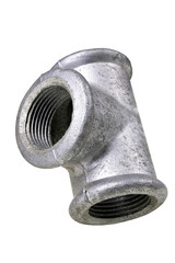Metal hydraulic tee for connecting pipes. Accessories used to repair plumbing.