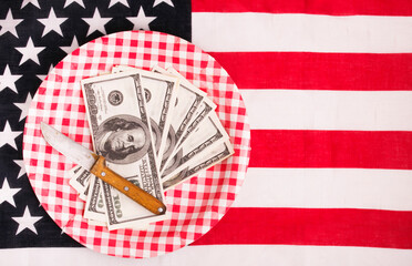Obraz premium plate with american money on the usa flag