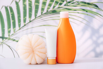 Cosmetics SPA branding mockup, minimalist style. Clear shower gel bottle and sponge on light background.