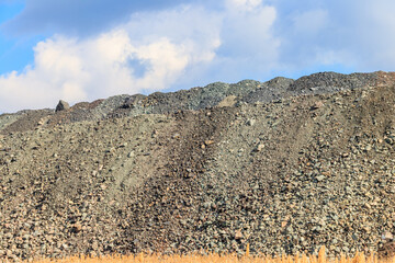 View of slag heaps of iron ore quarry. Mining industry