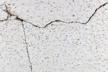 Cracked and rough wall surface texture background. Macro photography 