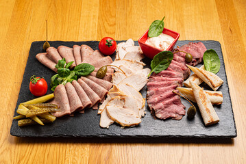 meat appetizer on the black stone